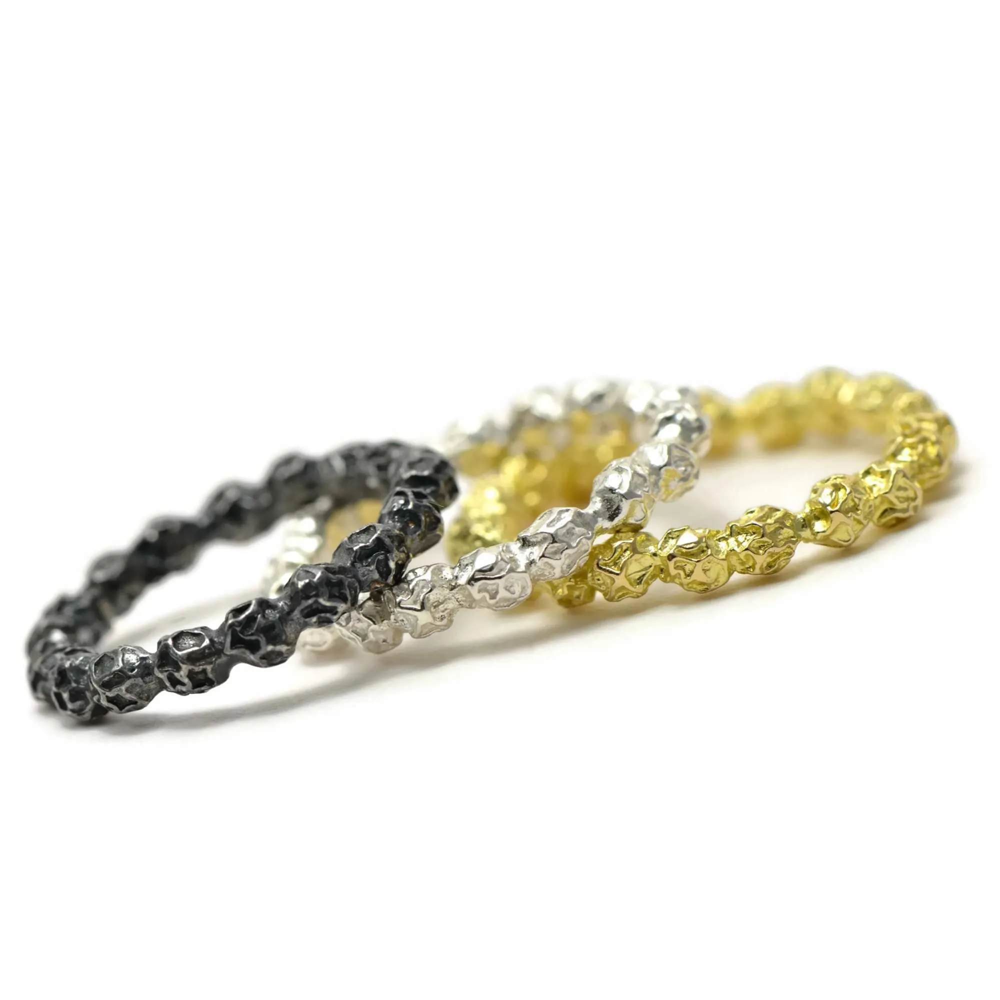 A delicate band of peppercorns ring, wedding ring.