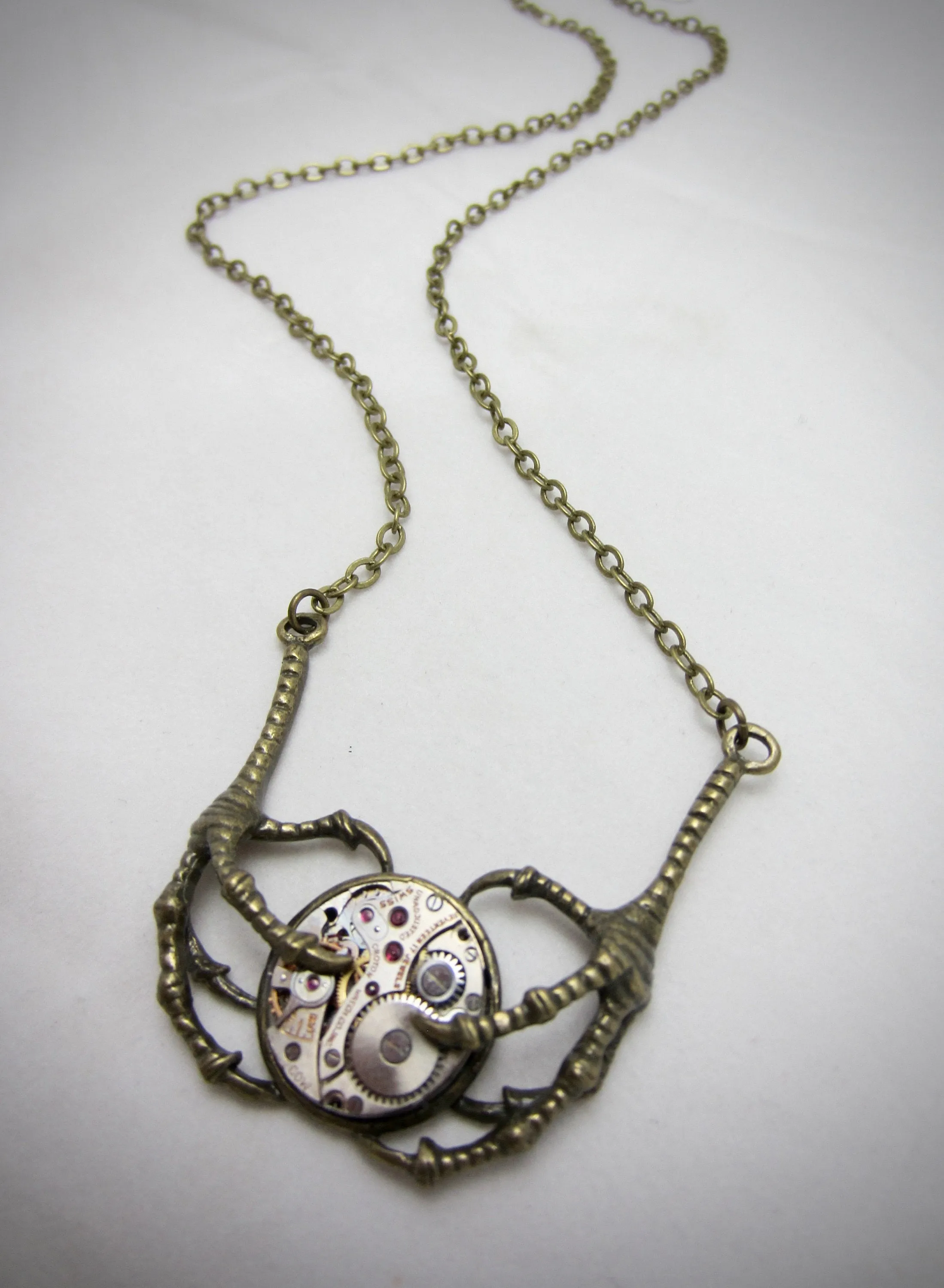 Bronze claw pendant - Steampunk Jewelry - Unique jewelry for kids - Claw holding Vintage watch movements