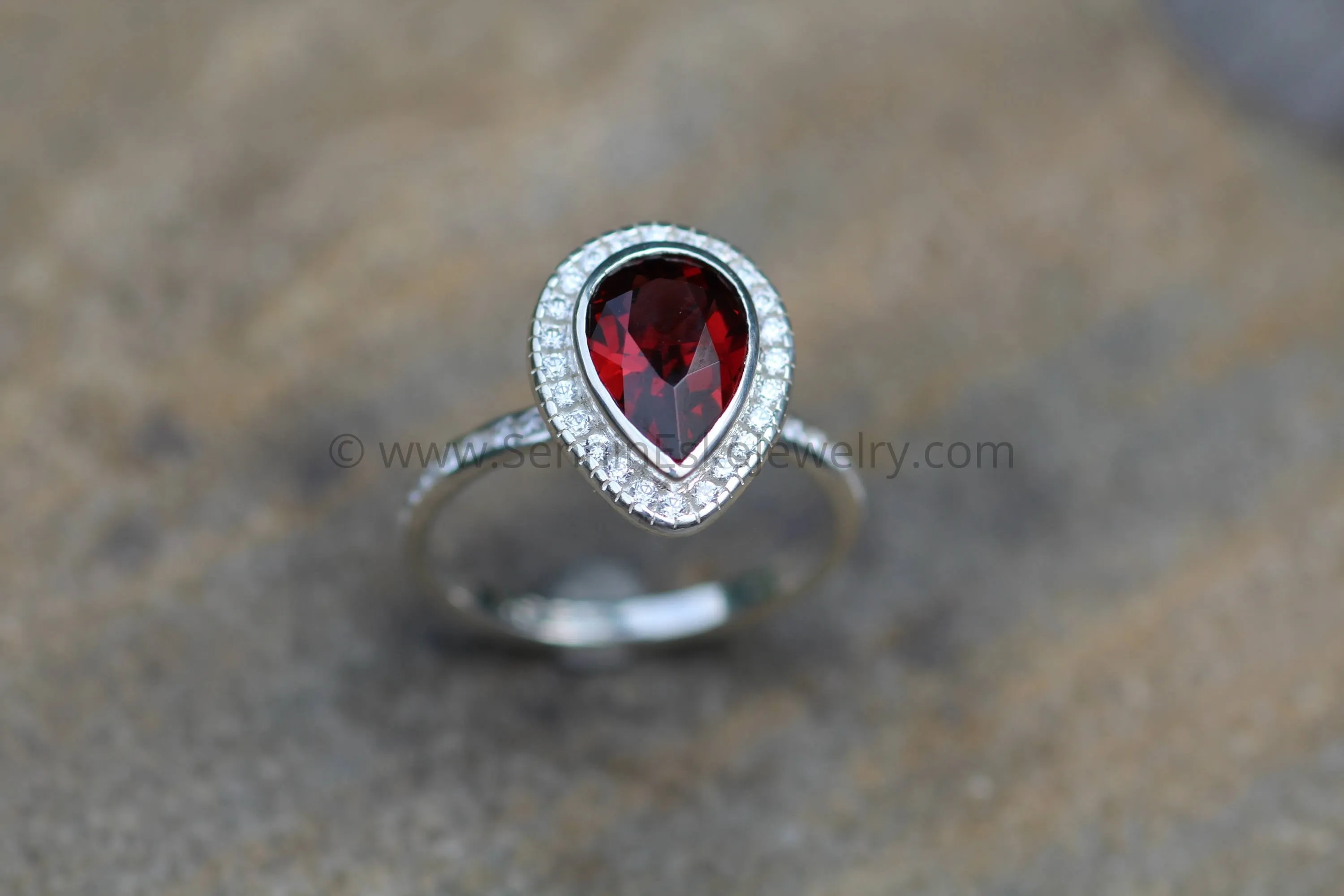 Diamond Halo Ring with Channel Set Band - Depcited with a Pear Cut Garnet (Setting Only, Center Stone Sold Separately)