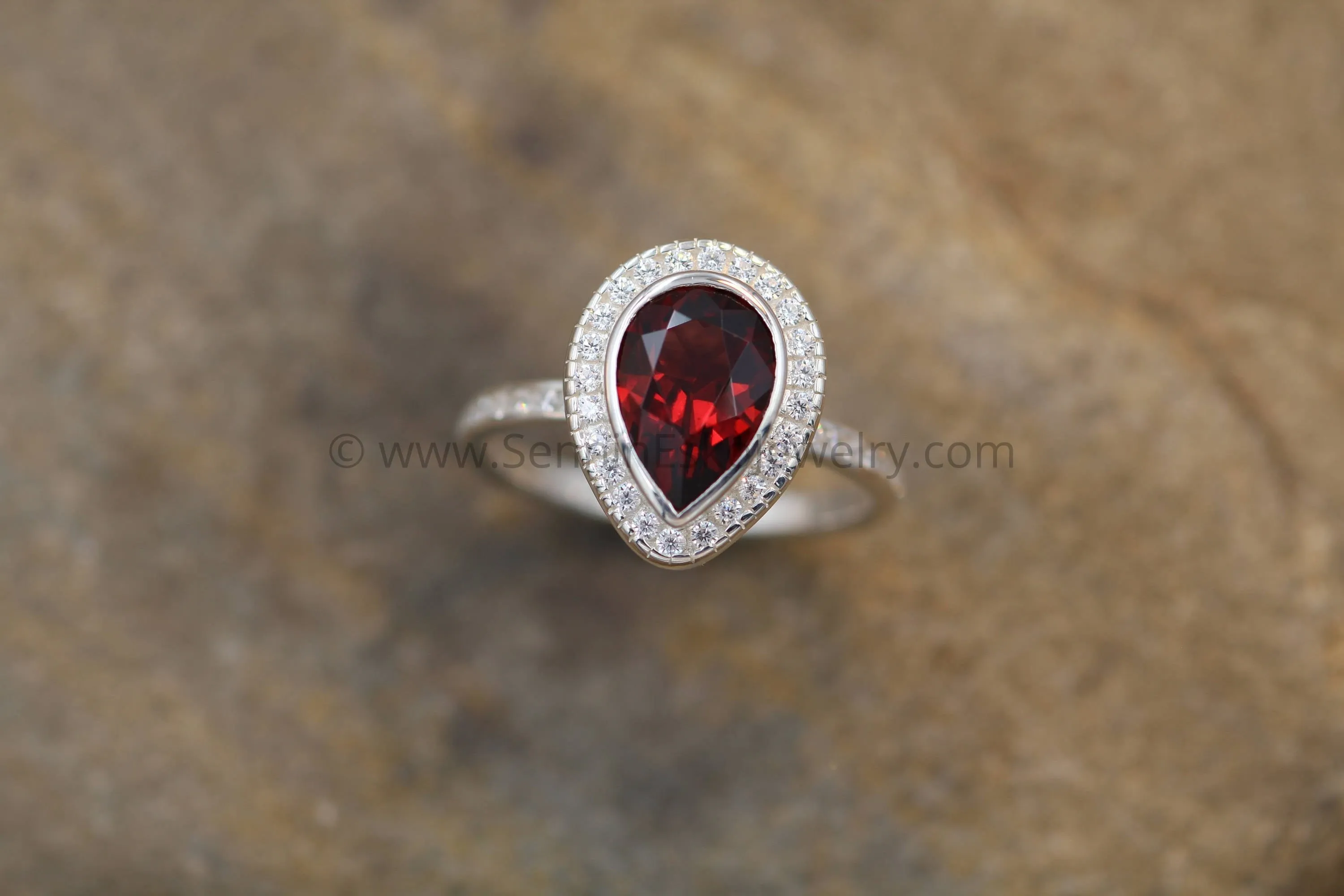 Diamond Halo Ring with Channel Set Band - Depcited with a Pear Cut Garnet (Setting Only, Center Stone Sold Separately)