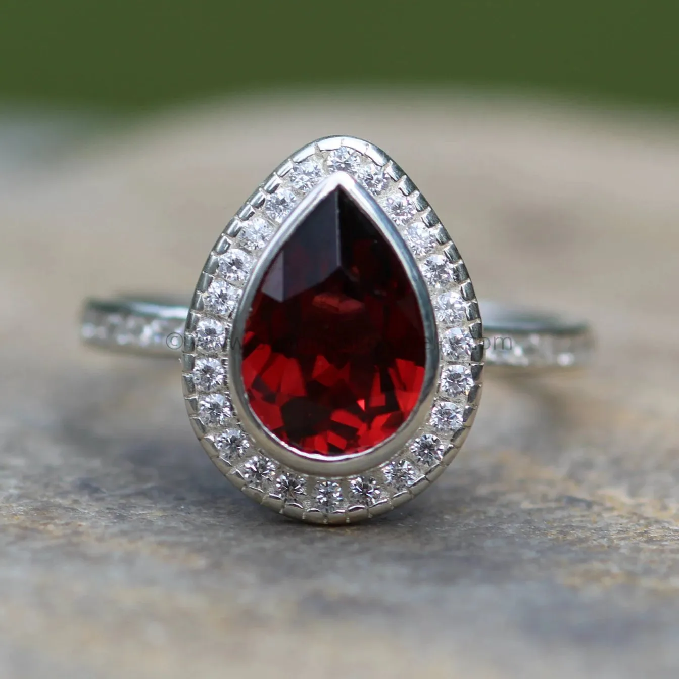 Diamond Halo Ring with Channel Set Band - Depcited with a Pear Cut Garnet (Setting Only, Center Stone Sold Separately)