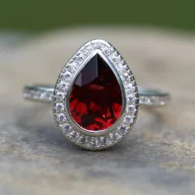 Diamond Halo Ring with Channel Set Band - Depcited with a Pear Cut Garnet (Setting Only, Center Stone Sold Separately)