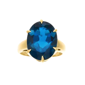 Oval Blue Topaz Cocktail Ring in 18k Yellow gold