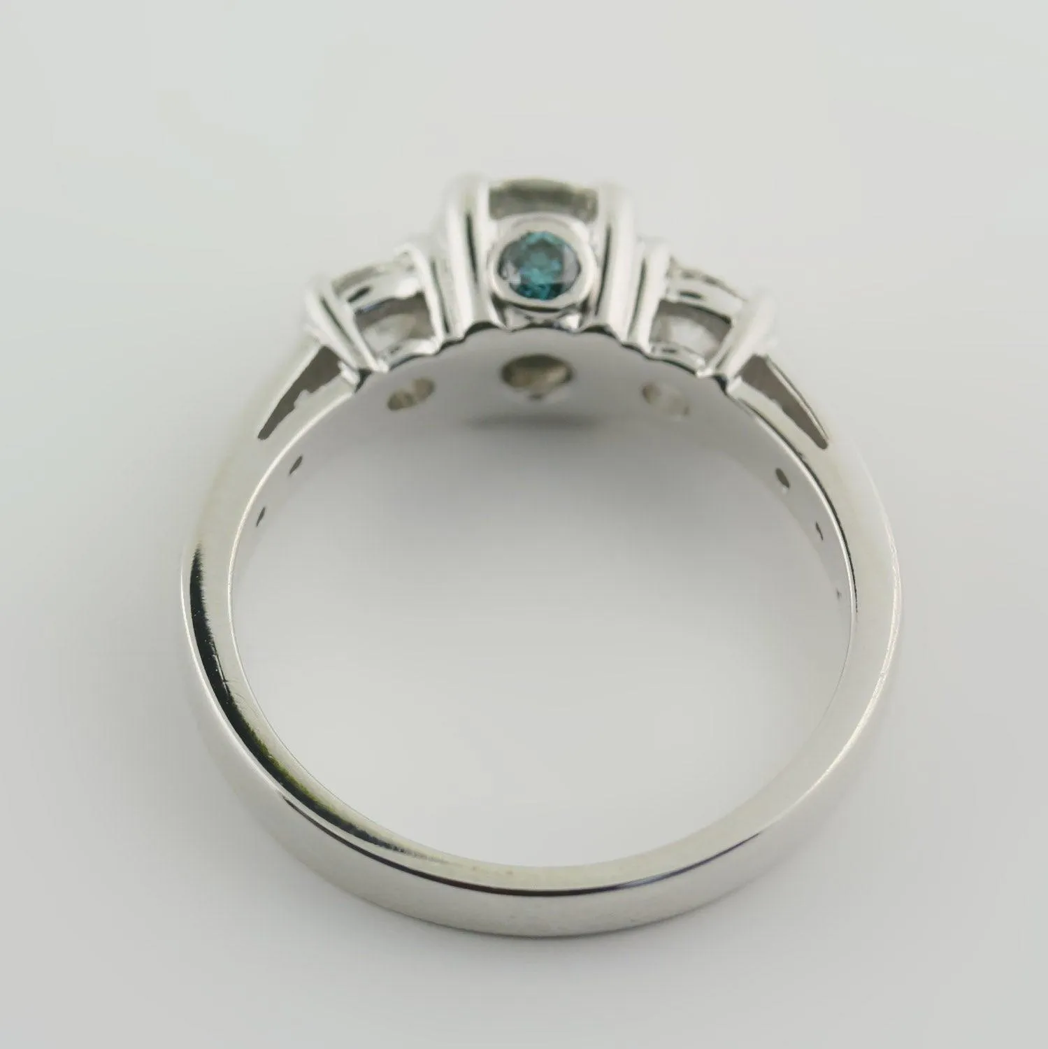 Romantic Engagement ring with Blue Diamond Accent