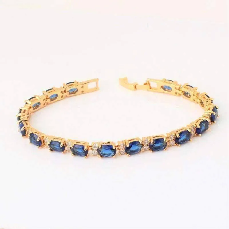 Sapphire Blue Oval Austrian Crystal Tennis Bracelet with Extender in 18K Yellow Gold for Woman
