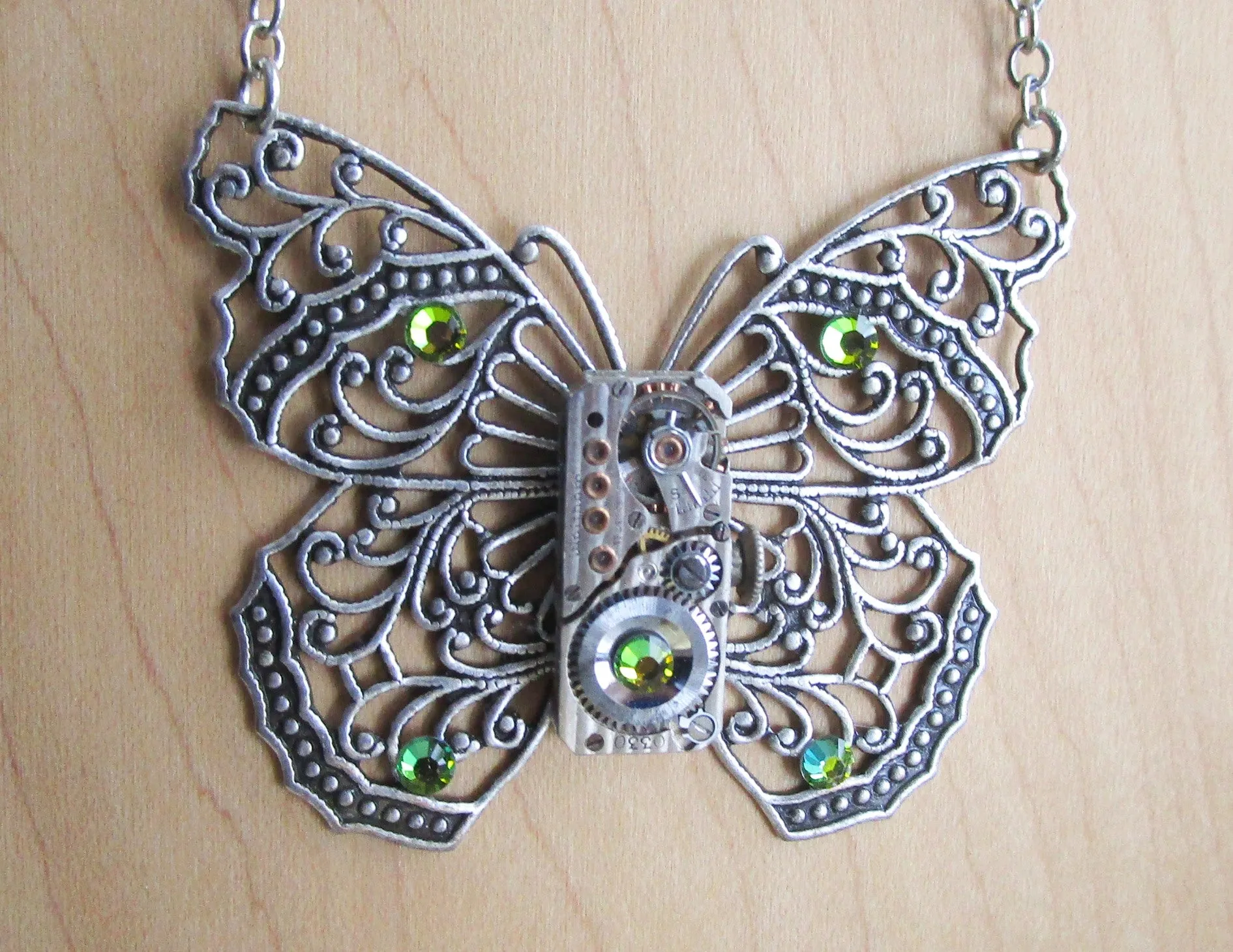 Silver Filigree Butterfly Watchworks Rainbow Crystal Necklace