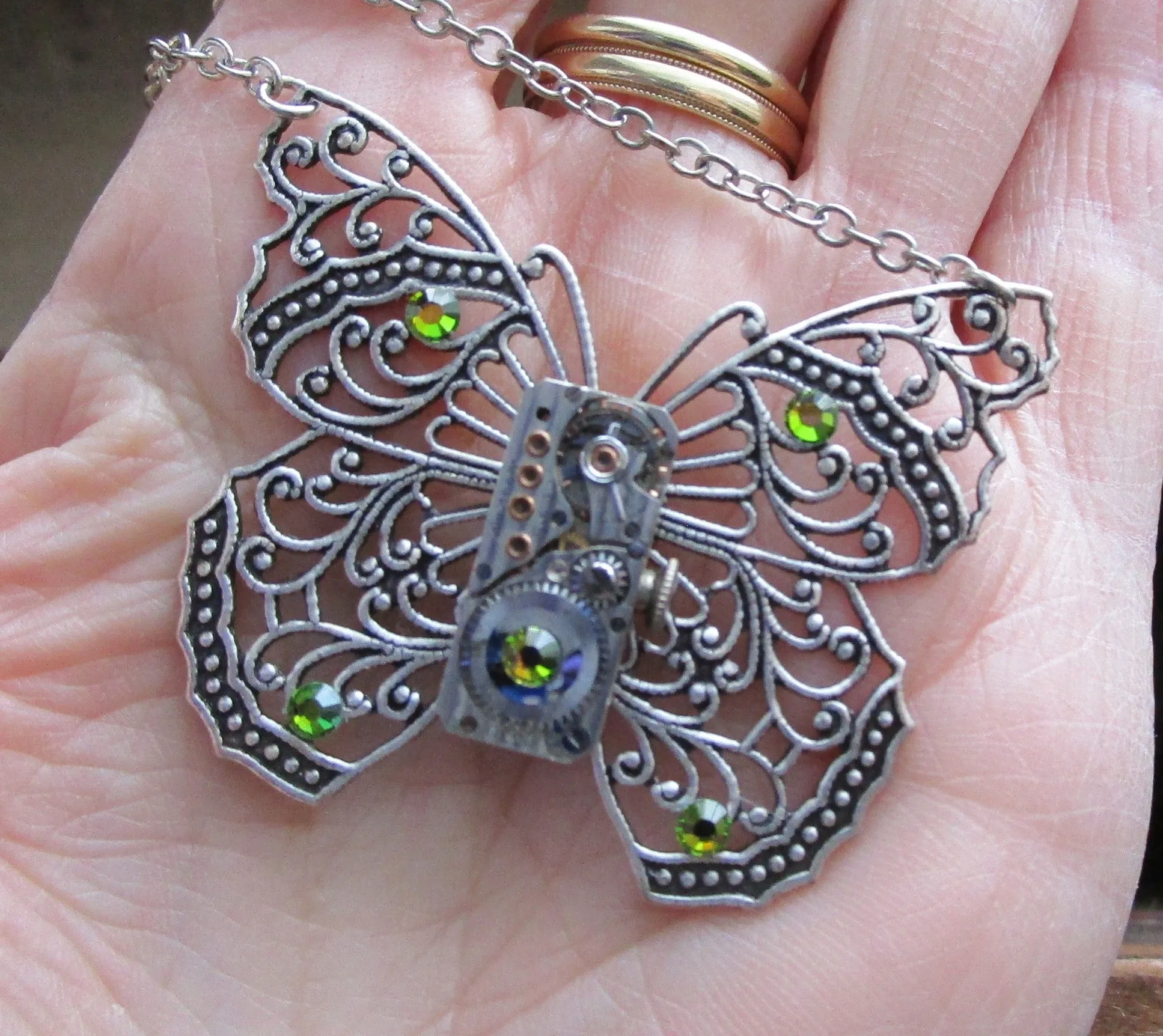 Silver Filigree Butterfly Watchworks Rainbow Crystal Necklace