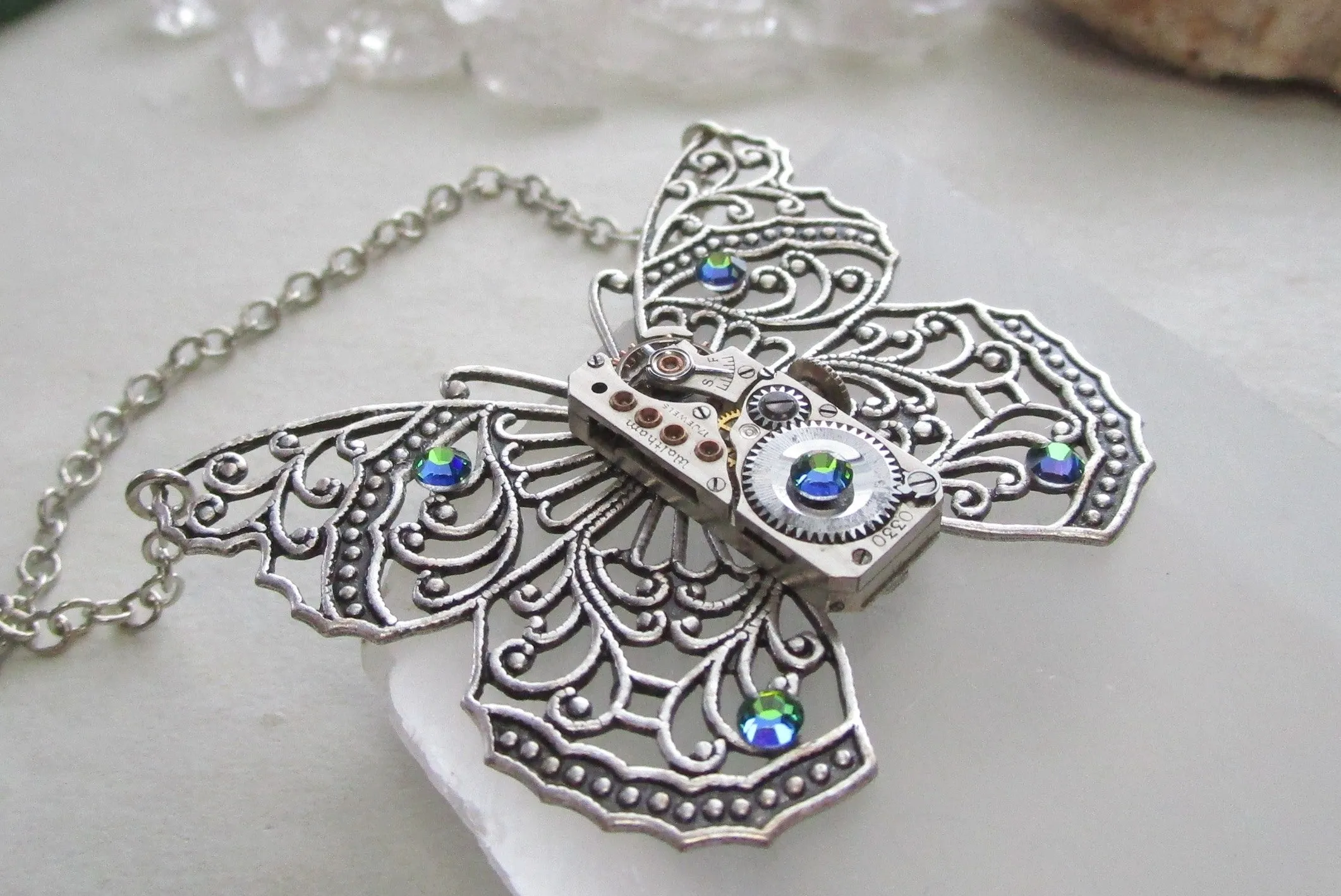 Silver Filigree Butterfly Watchworks Rainbow Crystal Necklace