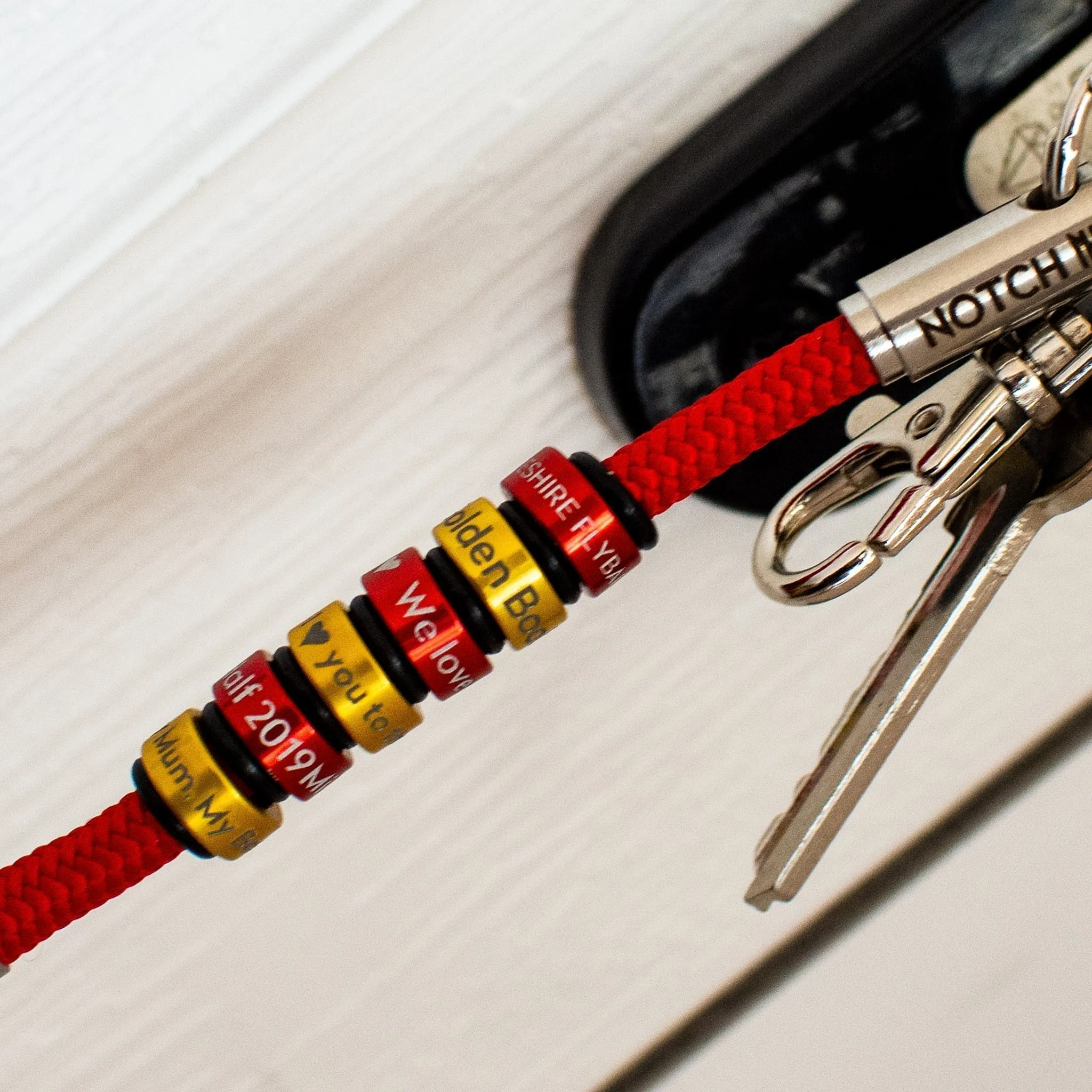 Sustainable OceanYarn NOTCH Tale - Coral with blue aluminium ends