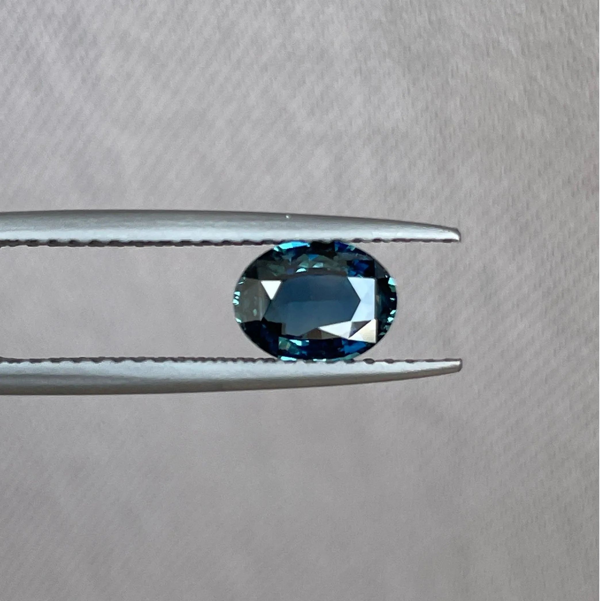 This 1.03 crt teal Sapphire is well cut to bring out the best colour and lustre, and has a perfect colour blend.