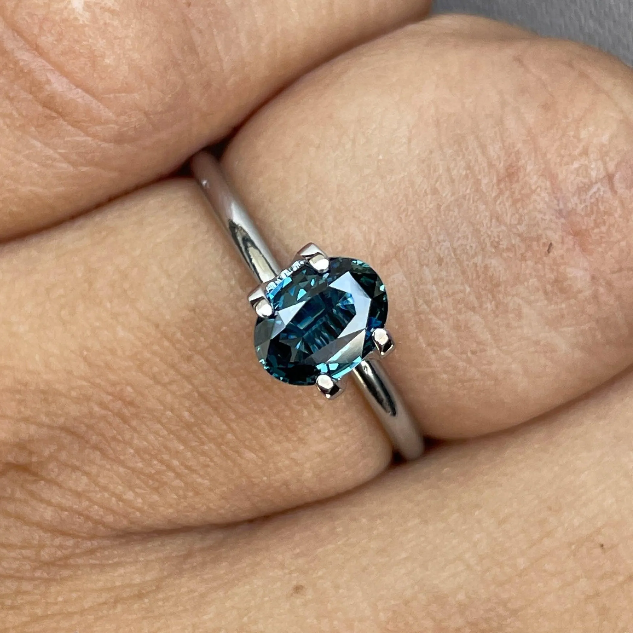 This 1.03 crt teal Sapphire is well cut to bring out the best colour and lustre, and has a perfect colour blend.