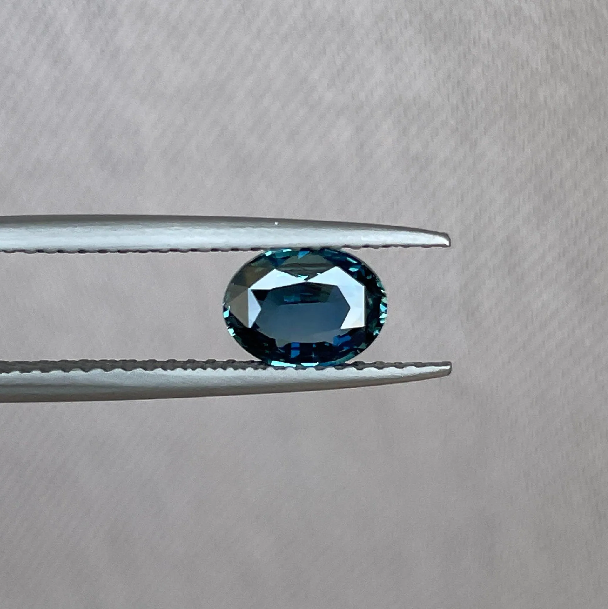 This 1.03 crt teal Sapphire is well cut to bring out the best colour and lustre, and has a perfect colour blend.